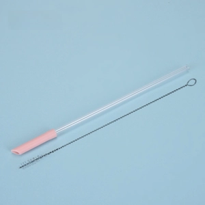 Light pink reusable Tritan straw with protective tip and stainless steel cleaning brush