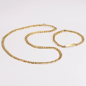 Close-up of gold stainless steel Cuban chain necklace and bracelet with engravable ID plate