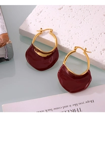 Detail of French vintage style burgundy enamel fan earrings with elegant gold plating