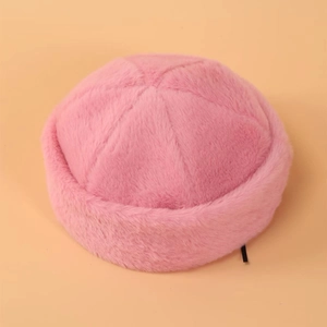 Close-up of soft pink faux fur docker hat showing plush texture and rounded dome shape