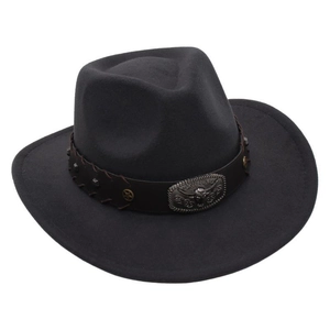 Close-up of a bull head relief metal buckle and studded leather band on a felt cowboy hat