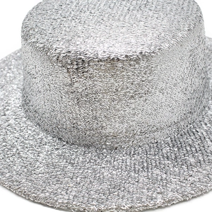Detailed view of silver sequin boater hat with metallic glitter texture for parties