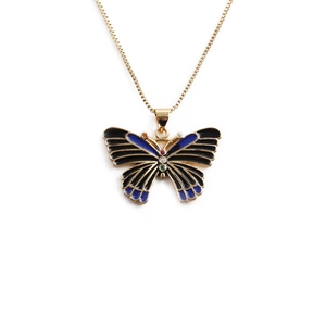 Gold plated butterfly necklace with blue enamel wings and colorful gemstones on white background