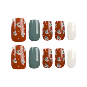 Short square press-on nails featuring red heart patterns, deep teal and cream solid colors