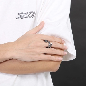 Detailed view of vintage silver dragon ring featuring intricate scale textures and retro carvings