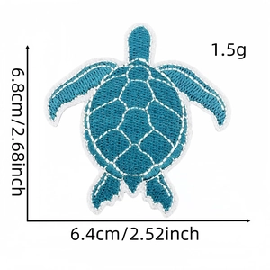 Detailed view of turquoise sea turtle embroidered patch with measurements in cm and inches