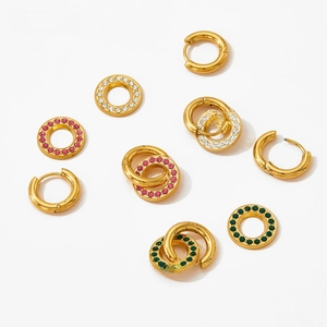 Detail showing detachable gold hoop earrings with colorful crystal oval charms on white