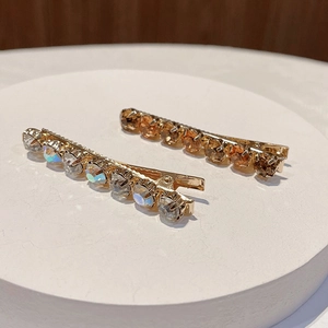 Elegant champagne and iridescent crystal rhinestones hair clips with metal alloy base