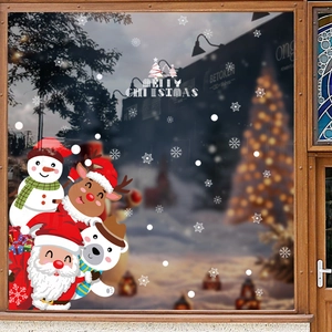 Festive Christmas window stickers featuring Santa, snowman, and reindeer on glass