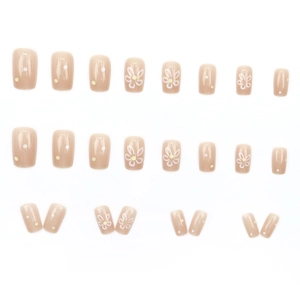 Short square press-on nails set with nude pink base and white daisy flower patterns