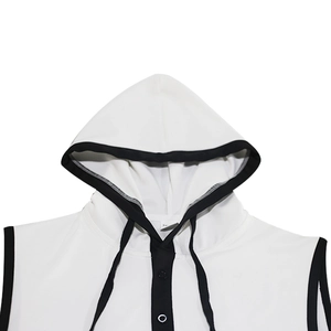 Detail of white hooded vest with black trim featuring button placket and drawstrings