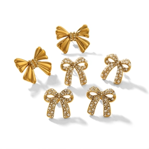 Three-pair set of bow-shaped stud earrings in gold, pearls, and sparkling crystals