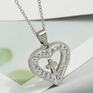 Minimalist stainless steel heart necklace with crystal border and inner cross pendant