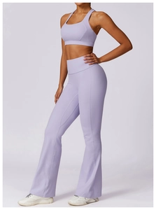 Detail of lavender yoga set with U-neck sports bra and high-waisted flared leggings