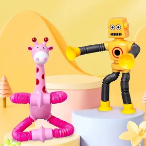 Pink giraffe and yellow robot suction cup telescopic toys for creative sensory play
