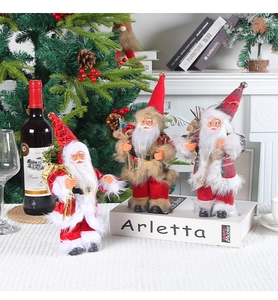 Three 9-inch Santa Claus figurines with sequins, fur, and plaid fabrics for holiday decor