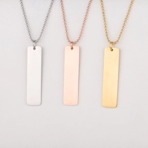 Polished rectangular stainless steel bar pendants in silver, rose gold, and gold finishes