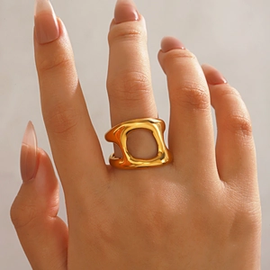 Bold chunky geometric hollow ring in 18k gold plated stainless steel on model
