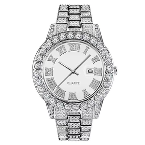Macro view of iced out hip hop watch with silver dial, crystals, and date window