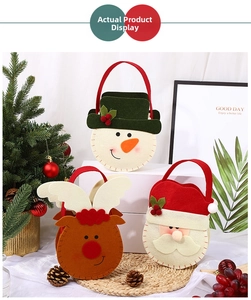 Detailed view of Christmas felt gift bags featuring 3D cartoon reindeer and snowman