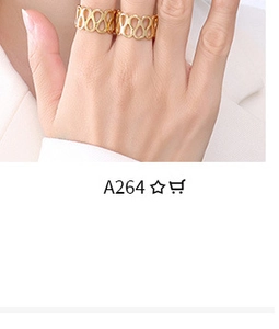 Detail view of two gold rings with continuous figure-eight hollow patterns on fingers