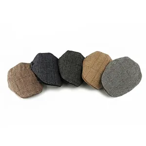 Five assorted vintage plaid wool flat caps for men in various warm winter colors