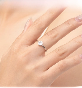 Close-up of minimalist S925 silver ring featuring a square-cut sparkling cubic zirconia