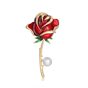 Detailed view of a red enamel rose brooch with golden stem, green leaf, and white pearl