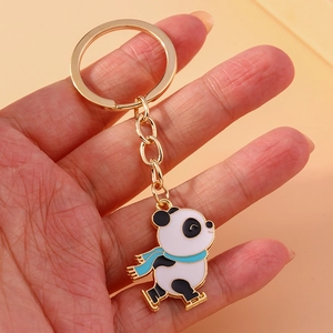 Cute enamel panda keychain with blue scarf and gold ring, handheld skating panda charm