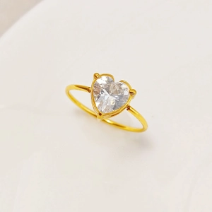 Minimalist gold heart ring with cubic zirconia stone and three-prong setting for women