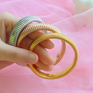 Elastic spring metal bangles in gold, rose gold and silver finish for fashion jewelry
