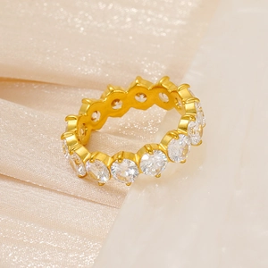 Eternity ring in 18k gold plated stainless steel with round cubic zirconia settings