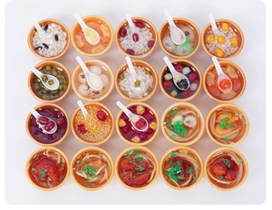Detailed grid view of twenty diverse miniature Chinese food bowls with spoons