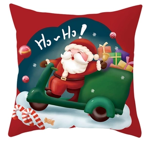 Detailed view of Santa Claus on scooter pillowcase with red festive Ho Ho lettering