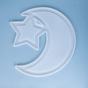 Detailed view of the star and moon shaped silicone mold for DIY resin craft tray projects