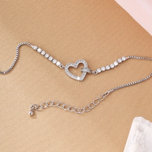 Elegant silver heart bracelet with sparkling cubic zirconia on a minimalist box chain