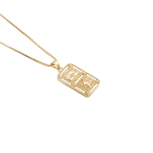 Gold pendant necklace featuring embossed cloud and lightning designs with zircon accents