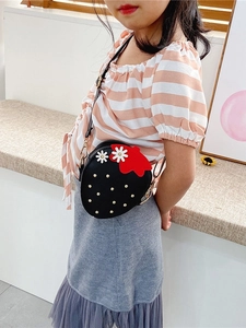 Cute black strawberry shaped crossbody bag for girls with adjustable strap and floral detail