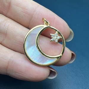 Golden moon and star pendant with mother of pearl inlay and micro-pave zircons