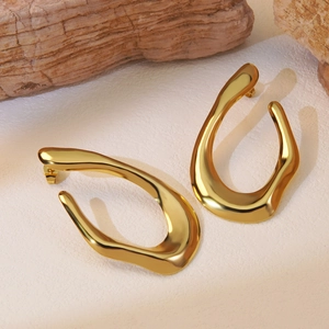 Irregular chunky gold geometric hoop earrings in polished steel for women stylish accessory