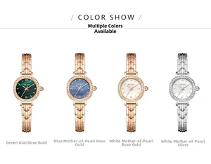 Detail view of four luxury women's wristwatches with diamond bezels and mother of pearl dials