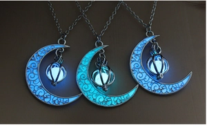 Luminous moon necklaces with blue glow-in-the-dark globes and hollow patterns