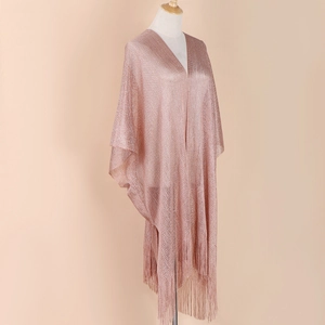 Detailed view of pink metallic shawl featuring open front design and soft fringe tassels