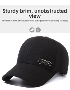 Detail of black baseball cap featuring precision sports embroidery and twill fabric texture