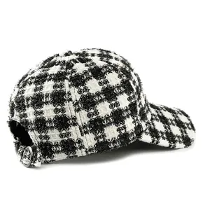 Classic black and white plaid tweed baseball cap with adjustable silver metal buckle