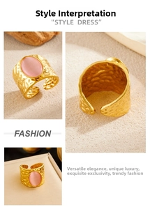 Macro detail of gold-plated hammered ring with oval pink gemstone and textured finish