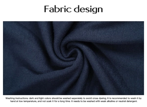Detailed view of navy blue ribbed knit fabric texture with soft drape and washing guide