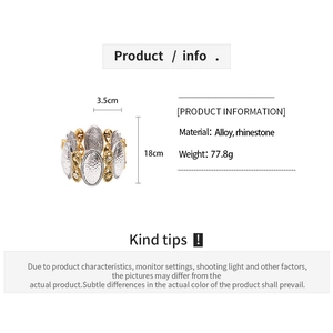 Vue détaillée du bracelet en métal bicolore montrant les dimensions et les strass