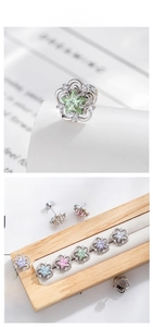 Detail view of flower star ear studs with colorful zircon stones and screw back closure
