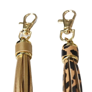 Handmade woven PU leather keychain charms with gold leopard and solid tassels